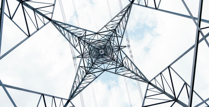 Looking upwards at a power tower_Digital - Website - Standard ImageCard