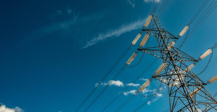 Pylon power lines and blue sky_Digital - Website - Standard ImageCard