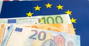 eu-banknotes-money-on-flag-in-europe-business-and-finance-concept CARD