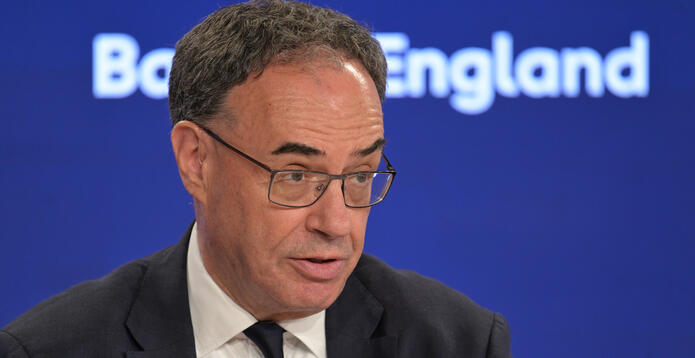 Andrew Bailey talking into mic
