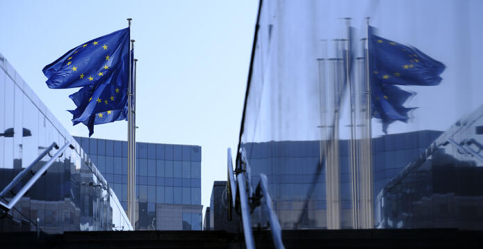  EU flags fly in front of the Berlaymont, the EU Commission headquarters