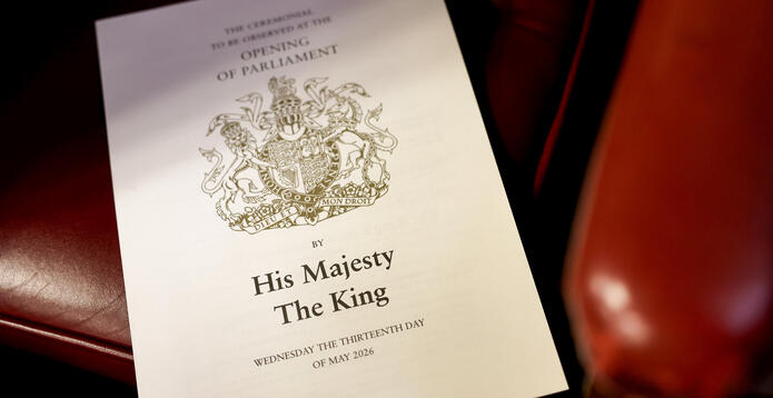 Programme for the Opening of Parliament bearing the royal coat of arms and the words “By His Majesty The King”
