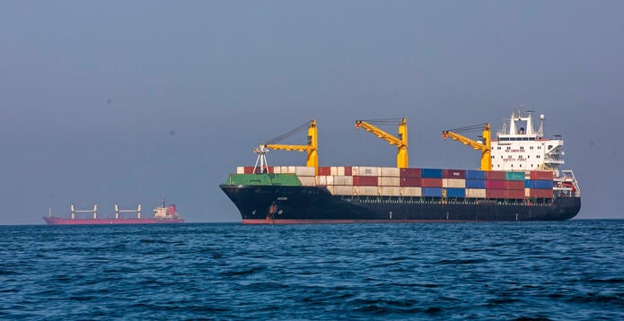 Ships remain anchored on May 16, 2026 in the Strait of Hormuz near Larak Island, Iran.