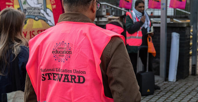 Striking sixth form teachers on their picket line outside Capital City College in London, England
