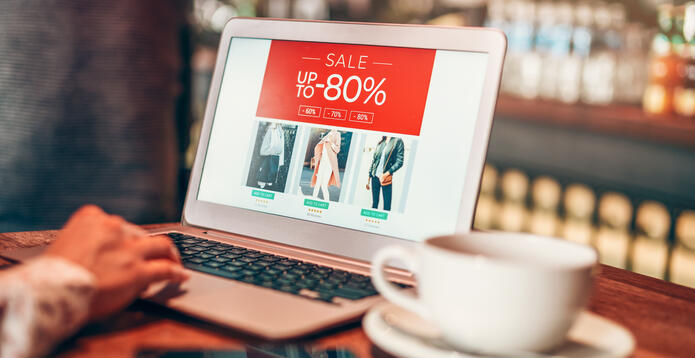 Online shopping sale displayed on a laptop screen
