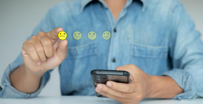 Man with customer satisfaction emojis_Digital - Website - Standard ImageCard