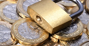 Padlock and coins fraud corporate crime - 695