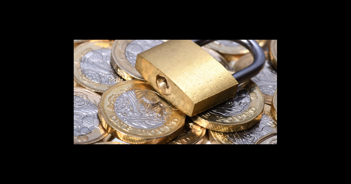 Padlock and coins fraud corporate crime - 695