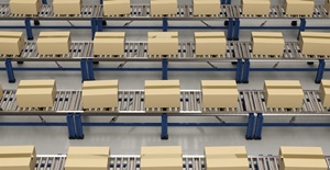 Logistics cardboard boxes on conveyor