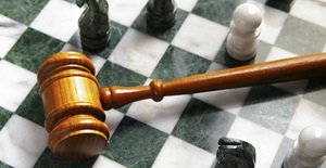 gavel on a chess board