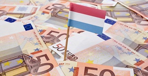 Flag of Luxembourg sticking in 50 Euro banknotes card