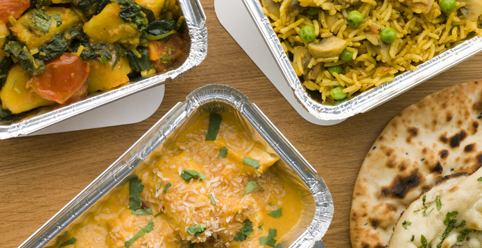Selection Indian Take Away Dishes In Foil Containers
