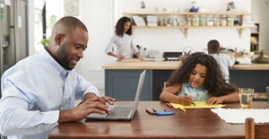 Young family parents family friendly working