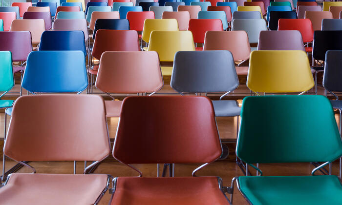 Rows of colorful chairs in Auditorium