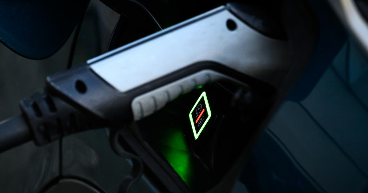 Close up of electric vehicle charging_Digital - SEOSocialEditorial image