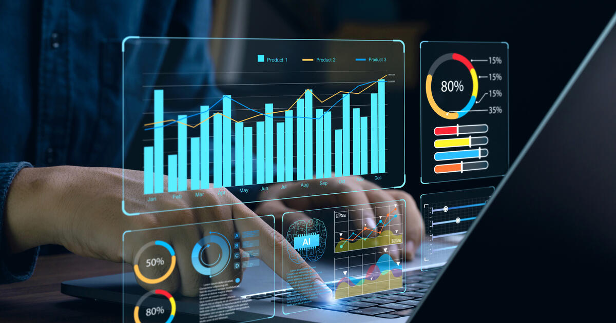 Businessman works on laptop Showing business analytics dashboard