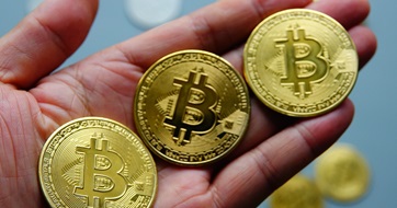 Crypto coins depicted in physical form SEO