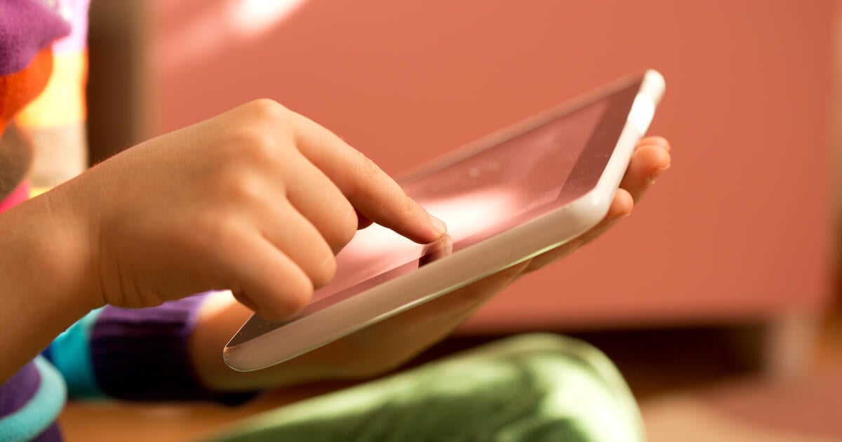 Kid with an touch pad