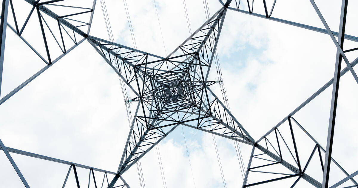 Looking upwards at a power tower_Digital - SEOSocialEditorial image