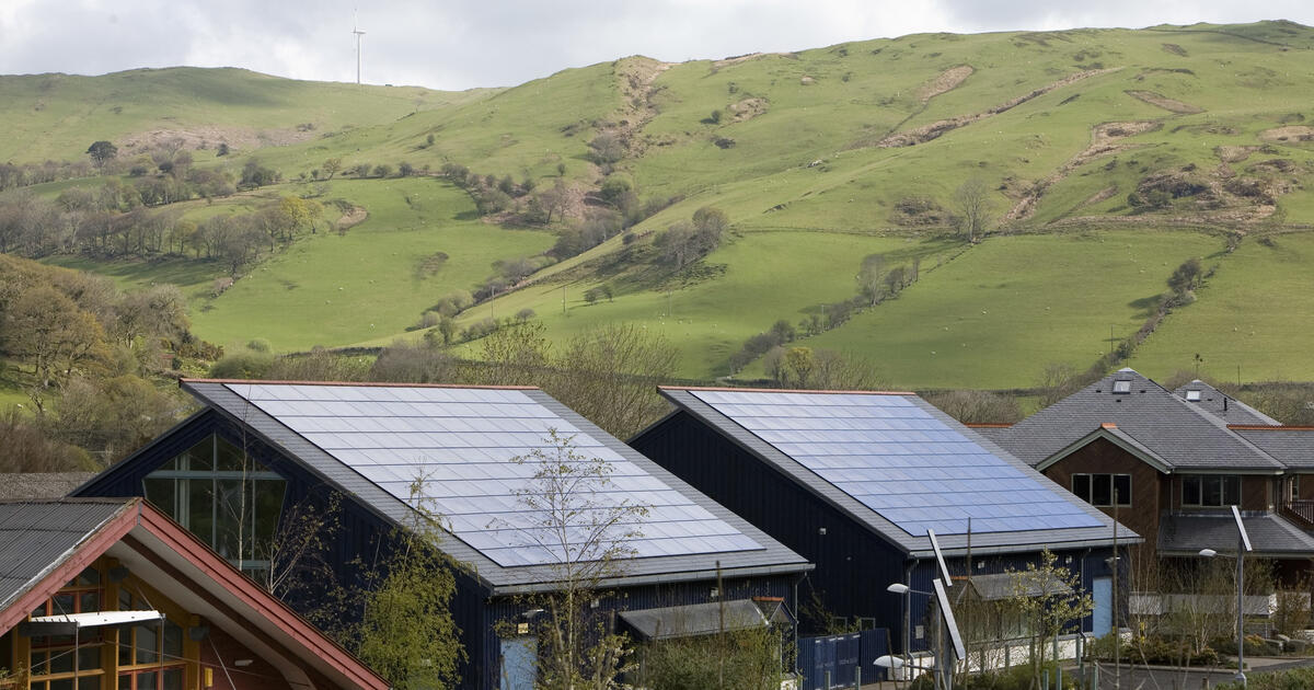Roofs tiled with photovoltaic solar energy panels in Dyfi Eco Park, Machynlleth, Wales