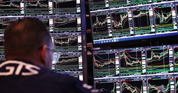 Financial trader and screens in NYSE SEO