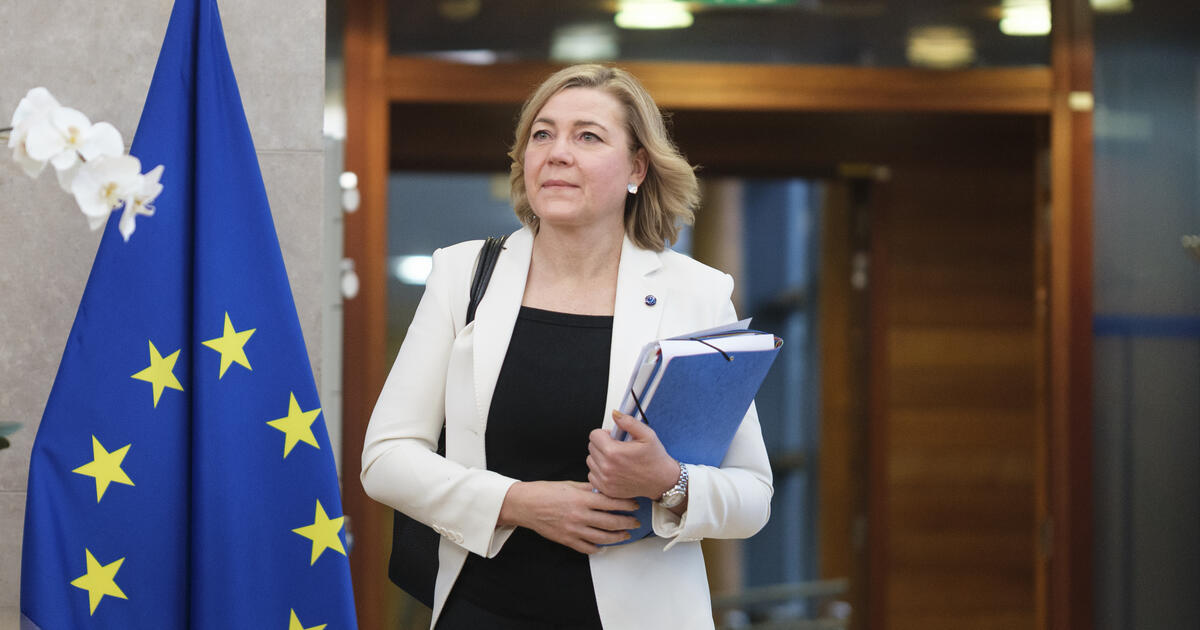 EU commissioner Henna Virkkunen with EU flag_Digital - SEOSocialEditorial image