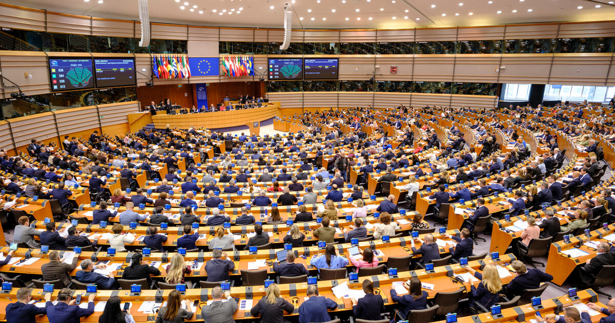 Members of the European Parliament vote during a plenary session of the European Parliament in Brussels, Belgium