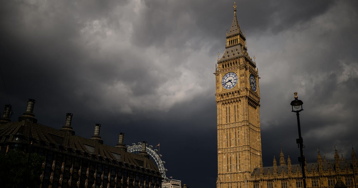 Storm clouds build on the horizon as sunlight illuminates Elizabeth Tower and the House of Commons on May 12, 2025 in London, England.