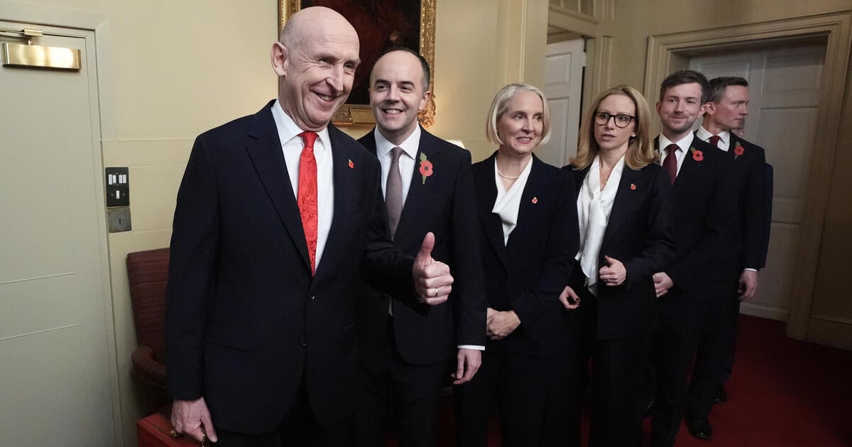 LONDON, ENGLAND - OCTOBER 28: Chancellor John Healey leaves number 11 Downing Street, with (second left-right) Financial Secretary to the Treasury James Murray, Chief Secretary to the Treasury Emma Reynolds, Economic Secretary to the Treasury Lucy Rigby, Exchequer Secretary to the Treasury Dan Tomlinson and Minister for Pensions Torsten Bell before delivering his first Budget to the Houses of Parliament on October 28, 2026 in London, England. This is Chancellor John Healey's first Budget under Prime Minister Andy Burnham following his entry into office in July. He faces a challenging economic landscape shaped by high government borrowing costs and global market pressures tied to the conflict in the Middle East. (Photo by Stefan Rousseau-WPA Pool/Getty Images)
