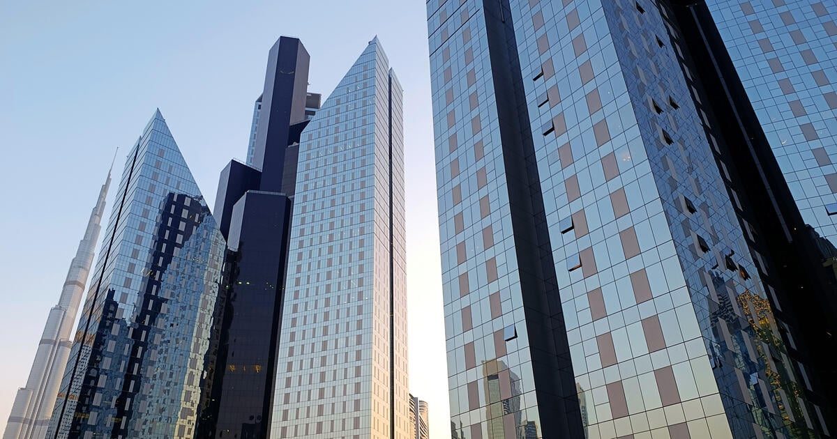 Dubai International Financial District skyscrapers at sunset
