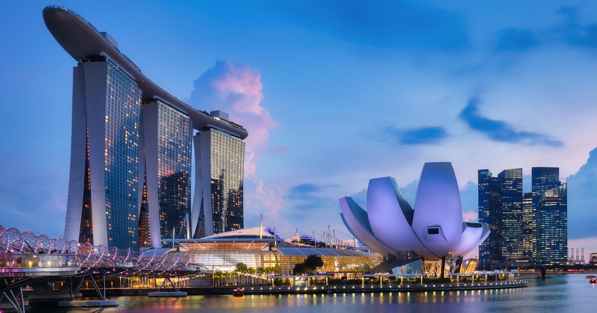 Singapore night city skyline at business distric - SEOSocialEditorial image