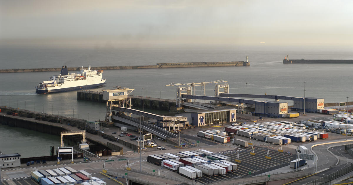 Ramps for the cars to enter the ferries with a ferry leaving the port in Dover  SEOSocialEditorial i
