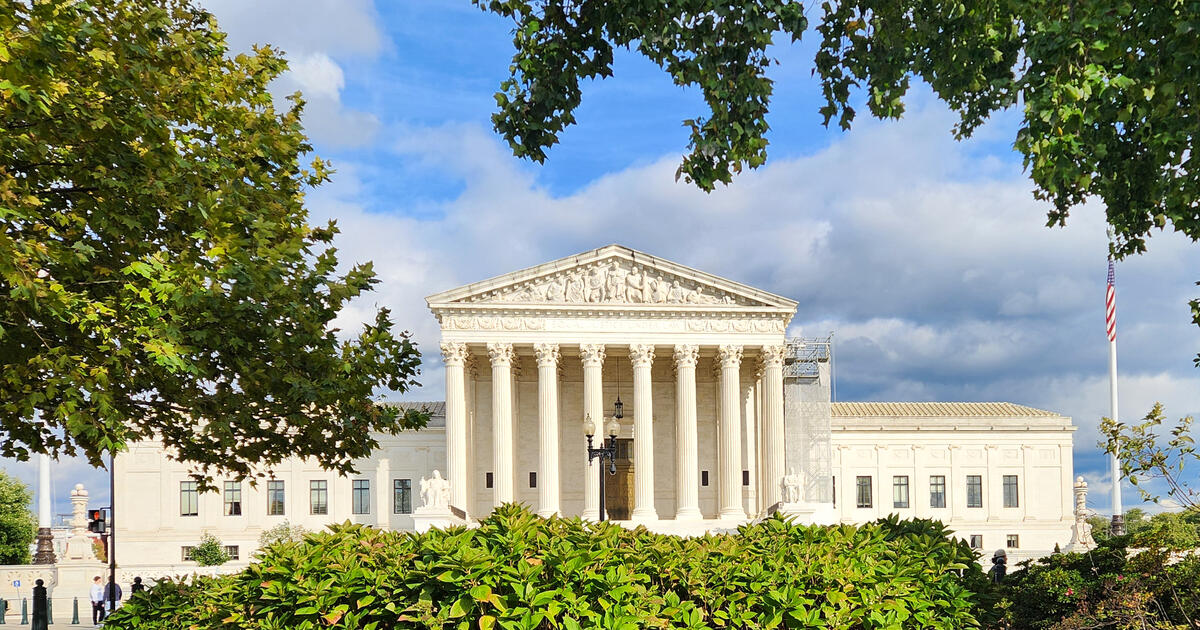 US Supreme Court framed by foliage_Digital - SEOSocialEditorial image