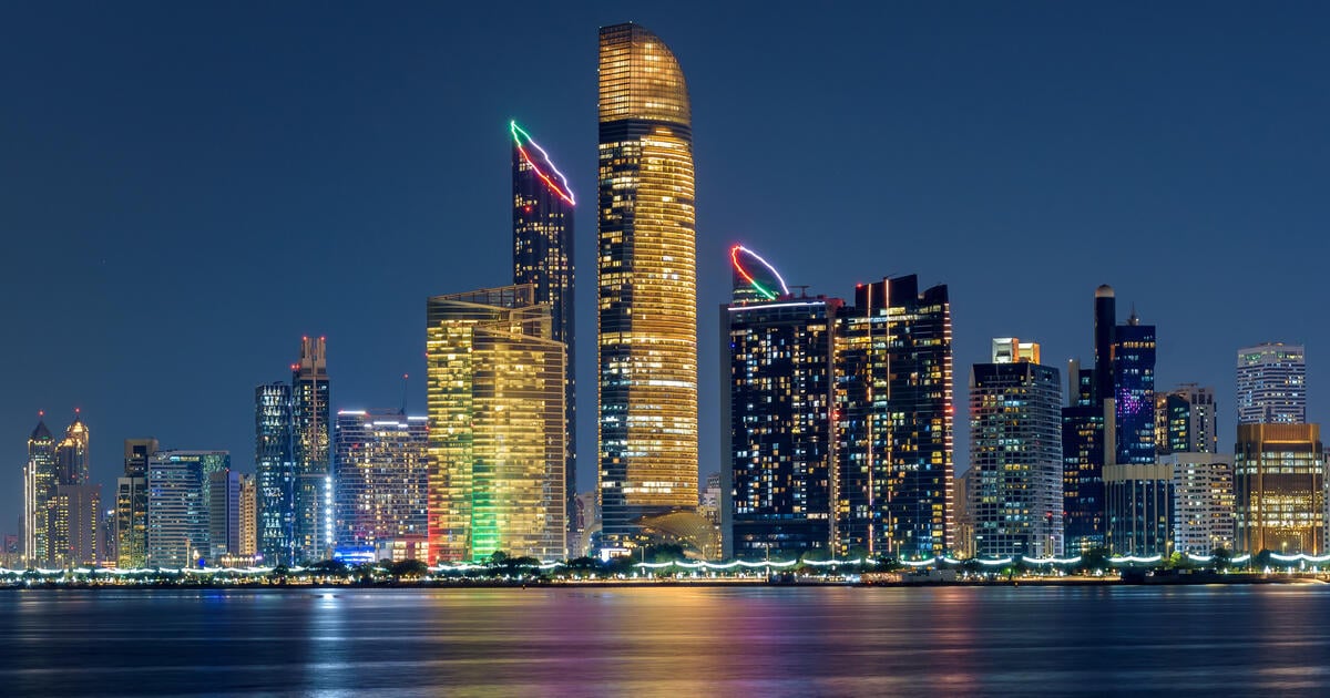 Vibrant night view of the illuminated Abu Dhabi waterfront