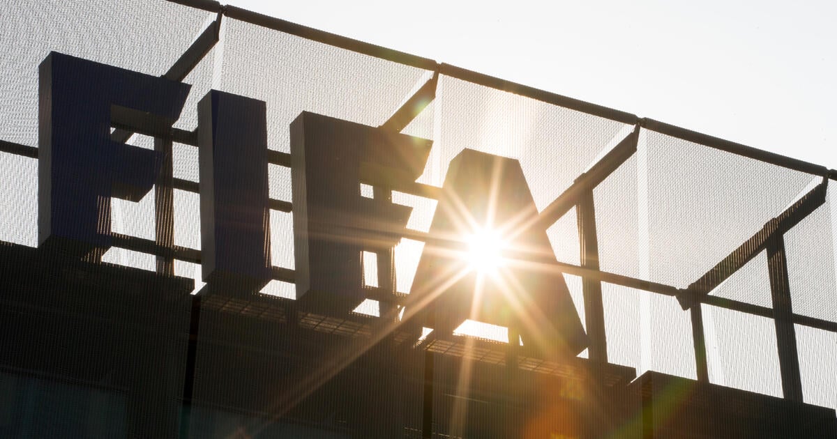 A FIFA logo sits on the rooftop at the FIFA headquarters in Zurich