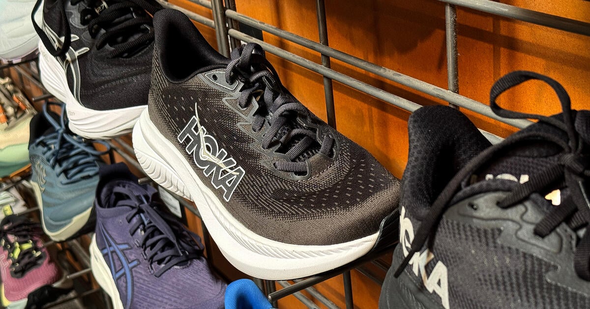 HOKA shoes on shoe stand