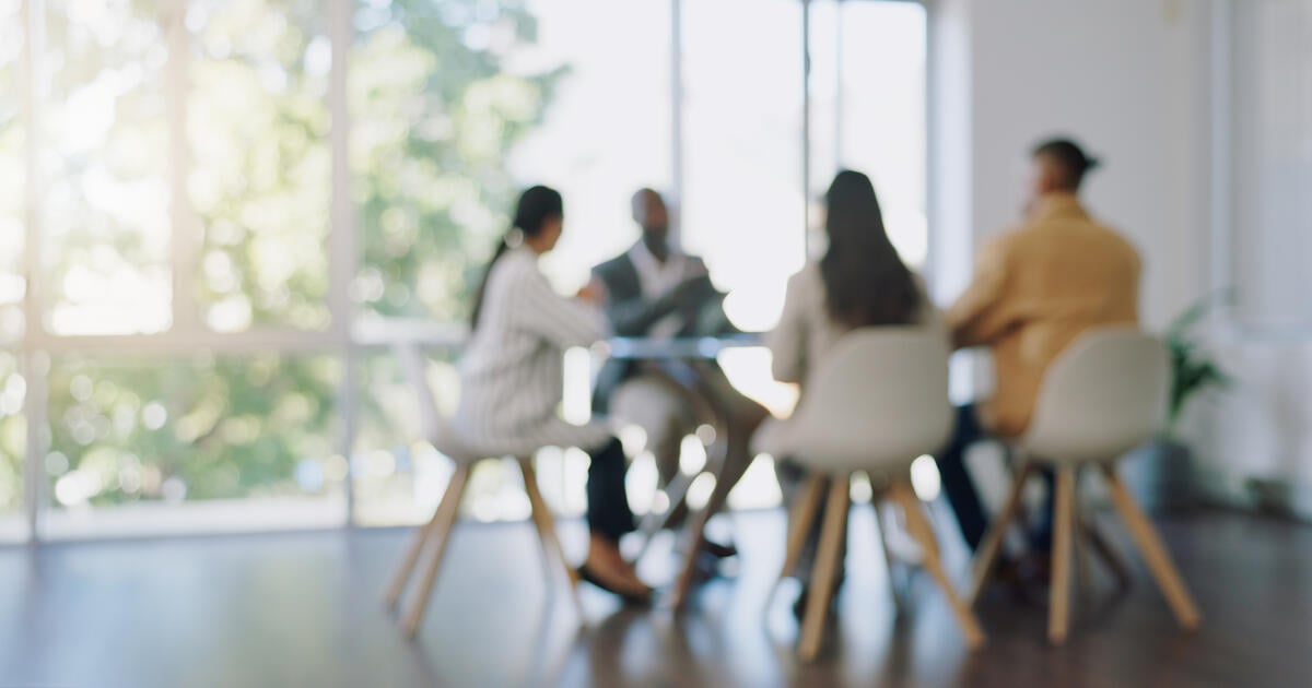 Business meeting blurred
