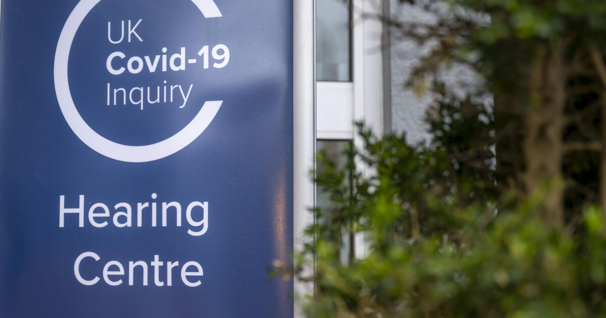A close-up of a sign at the entrance to the Covid-19 inquiry at the Mercure Cardiff North Hotel 