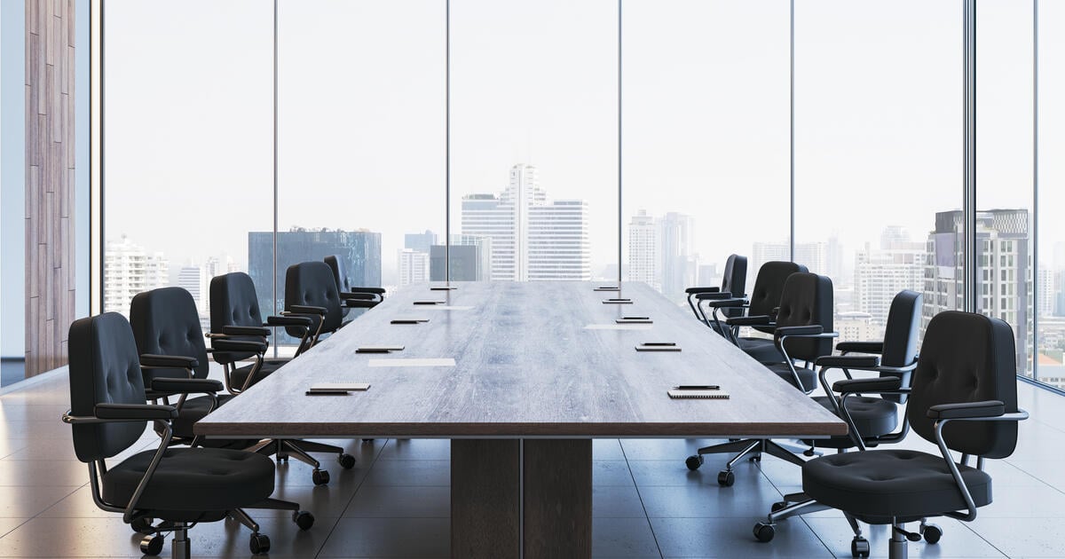 Empty board room with city outlook