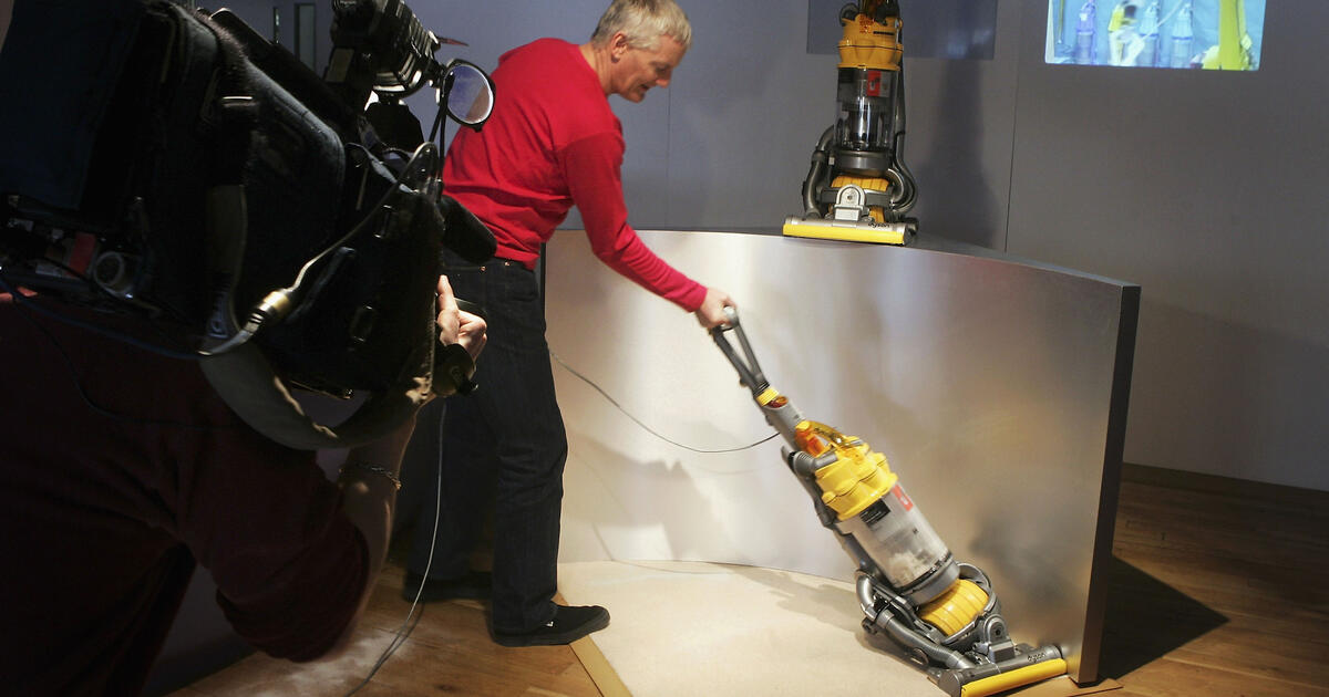 Inventor James Dyson demonstrating his latest vacuum invention in 2005