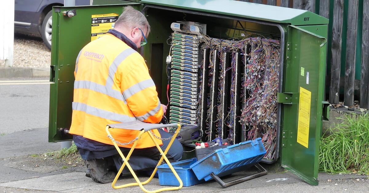 A broadband engineer working on connections in the UK