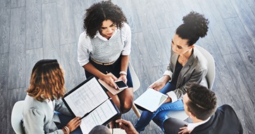open plan office meeting seo
