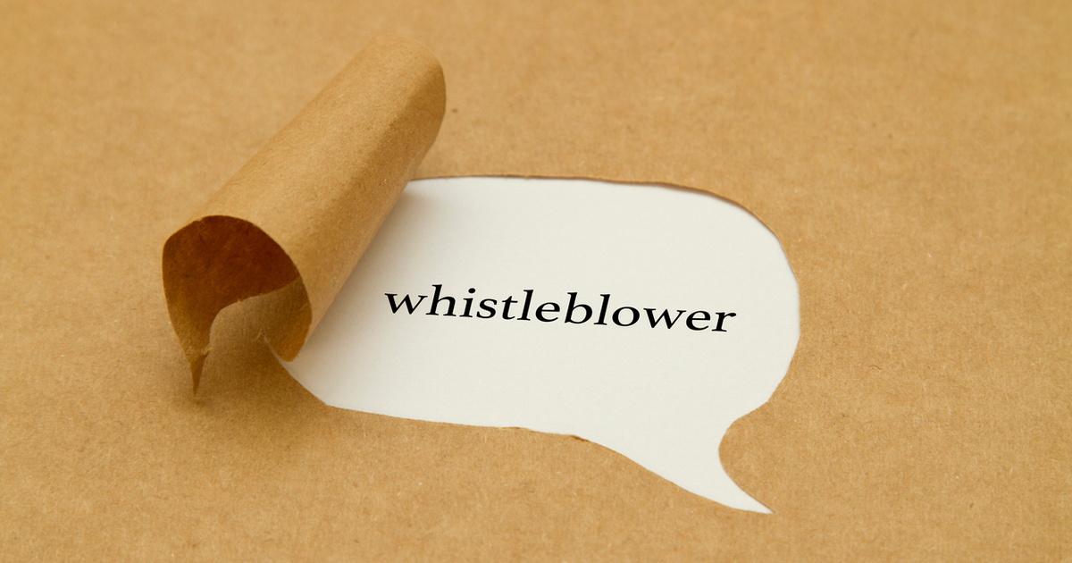 Whistleblower word on torn card