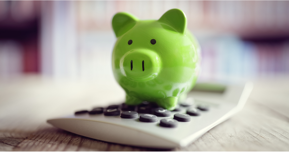 Green finance piggy bank with calculator-LinkedIn