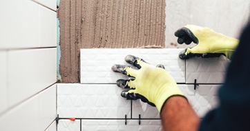 Construction work laying tiles SEO
