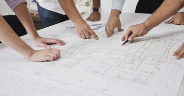 Team of architects on site - collaboration