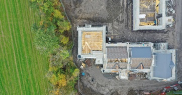 Housing development construction site in progress - aerial view