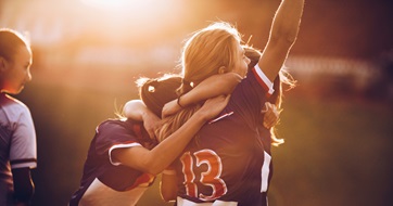 womens football team celebration